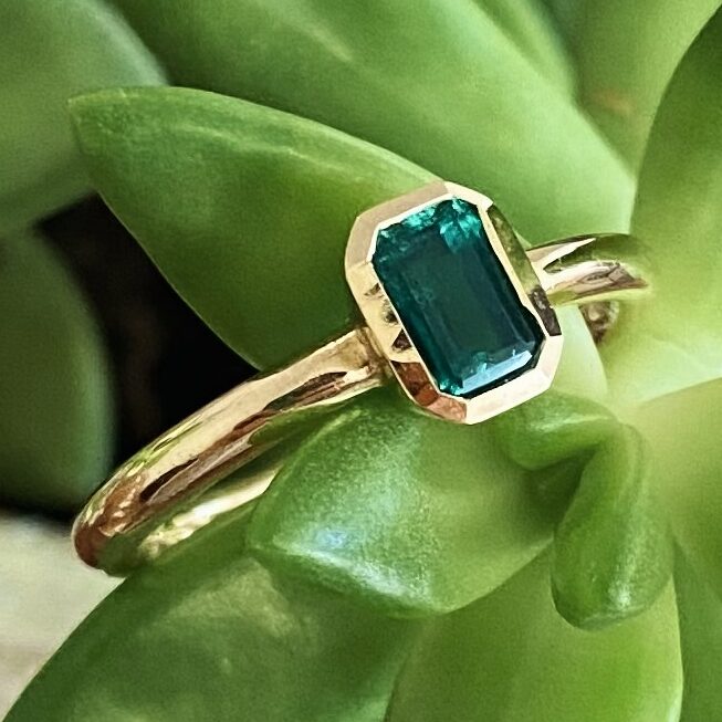 Emerald and deals gold engagement ring