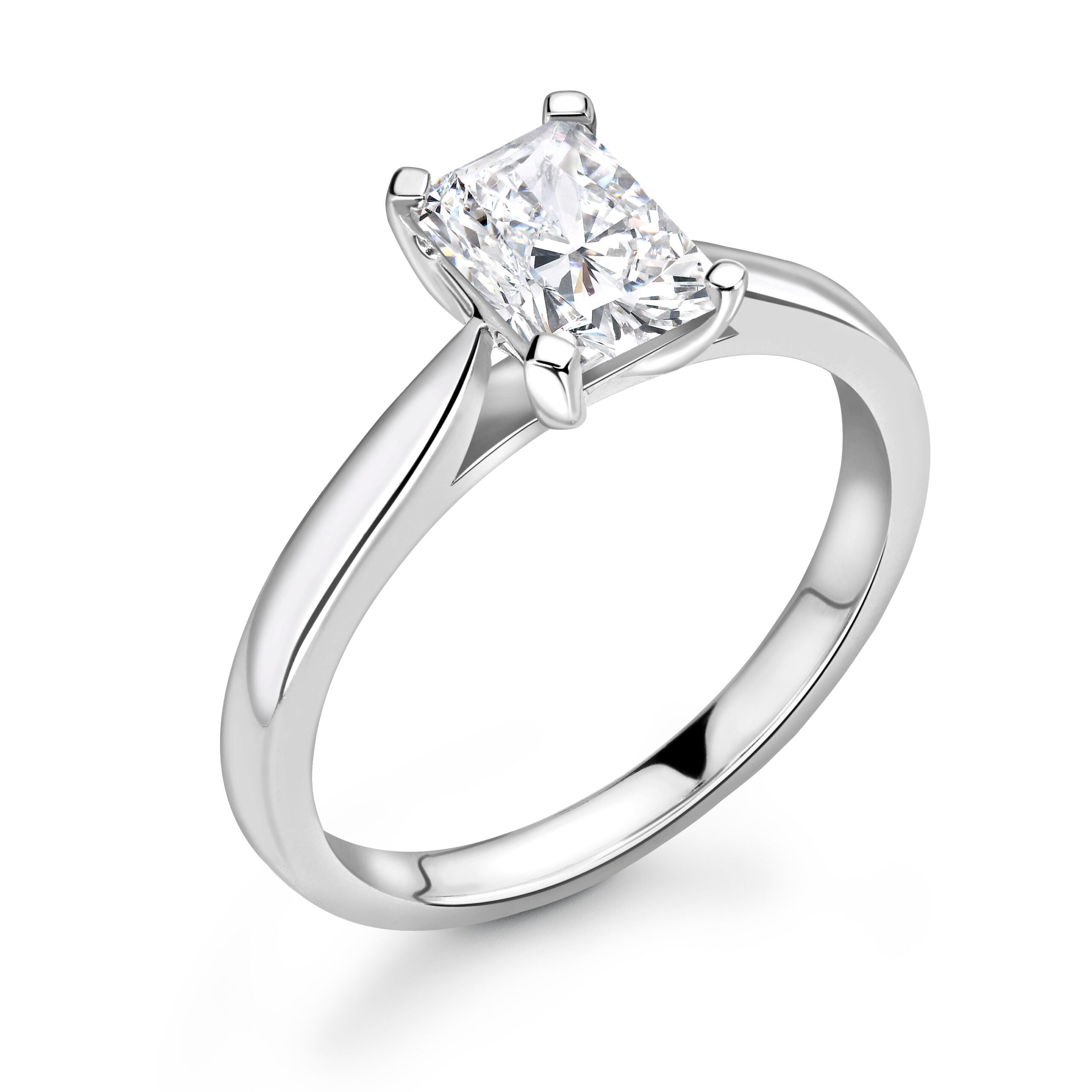 Emerald Solitaire Diamond ring in Platinum